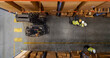 © Gorodenkoff - Top-Down Shot: Electric Forklift Truck Operator Lifts Pallet with Cardboard Box of in a Big Retail Warehouse a Shelf. Logistics Product and Goods Delivery and Distribution Center