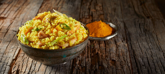 Wall Mural - Heaped bowl of savory quinoa and couscous