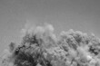 Dust clouds after detonator blast on the construction site 