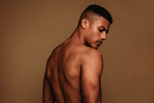 Rear View Portrait Of Muscular African American Man