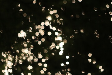 Wall Mural - Abstract urban night light bokeh, Christmas golden light,Golden bokeh abstract light,yellow circle background
