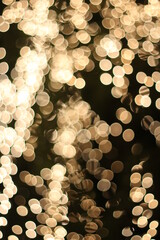 Wall Mural - Abstract urban night light bokeh, Christmas golden light,Golden bokeh abstract light,yellow circle background