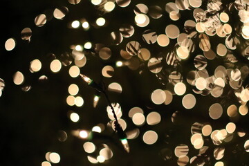 Wall Mural - Abstract urban night light bokeh, Christmas golden light,Golden bokeh abstract light,yellow circle background