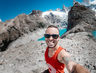 Poster - person standing on top of the mountain