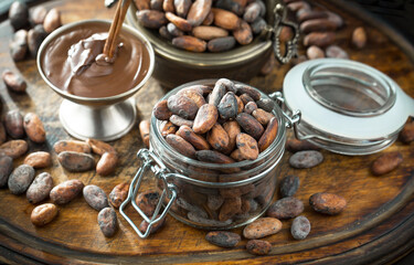 Cocoa beans on old background