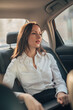 © eastwest photo - business woman in the car