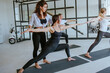 © lithiumphoto - Yoga class of young people group indoor