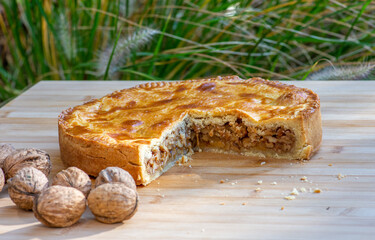 Bündner Nusstorte, or Engadiner Nusstorte,  a traditional sweet, caramelised nut-filled pastry from canton Graubünden in Switzerland. 