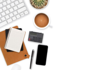 Top view white wooden workspace office desk with computer and office supplies. Flat lay work table with notebook, keyboard, cactus, calculator and coffee cup. Copy space for your advertising content