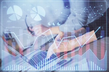 Multi exposure of woman hands typing on computer and financial chart hologram drawing. Stock market analysis concept.