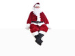 © Steve Cukrov - Senior man in traditional Santa Claus Suit sitting on a white wall.  Isolated on white with copy space.