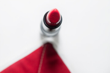 red lipstick on a white background