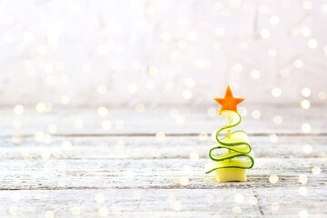 Creative christmas tree of cucumber, cheese and star of carrot. Funny kids food for new year party