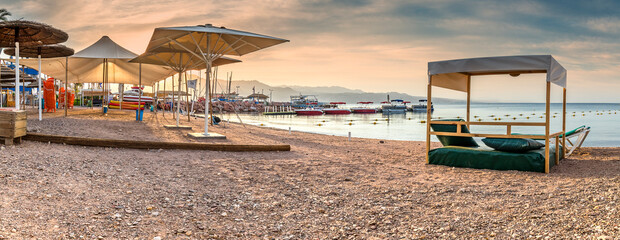 Morning panoramic view on relaxing facilities on sandy beach of the Red Sea, Middle East