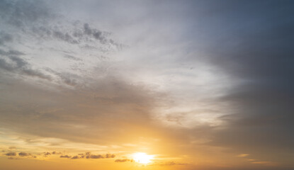 Wall Mural - abstract amazing scene of stuning colorful sunset with moving clouds background in nature and travel