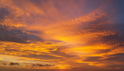 Wall Mural - abstract amazing scene of stuning colorful sunset with moving clouds background in nature and travel
