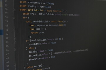 the program javascript code on the computer black screen. the concept of website, internet, cyber se