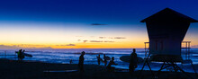 Sunrise At White Plains Beach Hawaii, A Gathering Of Surfers To Welcome The New Day.