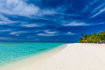 Wall Mural - White sandy beach in Maldives with amazing blue lagoon