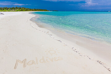 Wall Mural - White sandy beach in Maldives with amazing blue lagoon