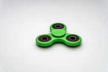 Green Spinner Isolated On A White Background