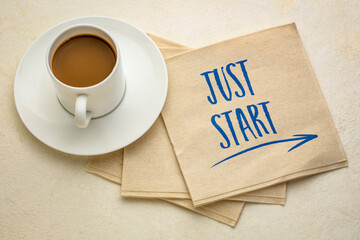 Wall Mural - just start - motivational writing on a napkin with a cup of coffee, business and personal development concept
