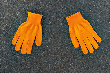 Pair of orange work gloves