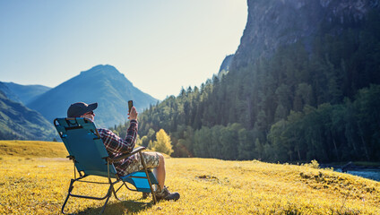 person using mobile phone in the wild
