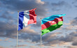 Beautiful national state flags of France and Azerbaijan together at the sky background. 3D artwork concept.