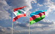 Beautiful national state flags of Lebanon and Azerbaijan together at the sky background. 3D artwork concept.