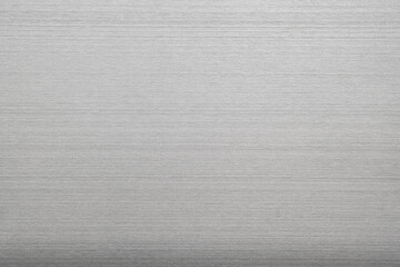 Wall Mural - silver metal texture of brushed stainless steel plate with the reflection of light.