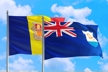 Anguilla and Andorra national flag waving in the windy deep blue sky. Diplomacy and international relations concept.