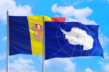 Antarctica and Andorra national flag waving in the windy deep blue sky. Diplomacy and international relations concept.