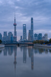Fototapeta Nowy Jork - Sunrise view of Lujiazui, the financial district in Shanghai, China, on a cloudy day.