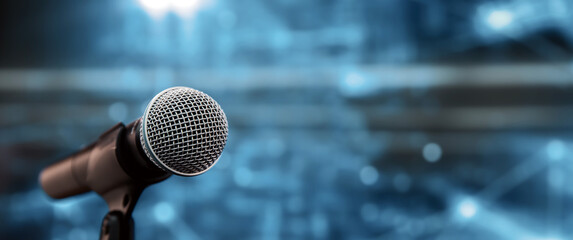 public speaking backgrounds, close-up the microphone on stand for speaker speech at seminar room wit