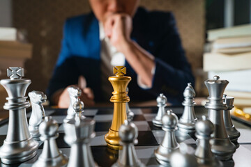 Wall Mural - close up business man formal suit hand think and planing to win chess board game business stratey organize and management ideas concept