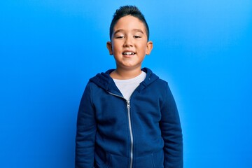 Poster - Little boy hispanic kid wearing casual sporty jacket with a happy and cool smile on face. lucky person.