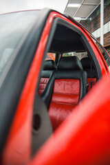 Poster - Vertical closeup shot of details on the red car