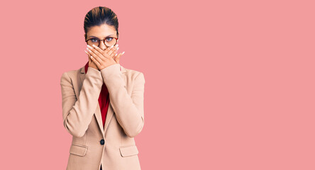 Poster - young beautiful woman wearing business shirt and glasses shocked covering mouth with hands for mista