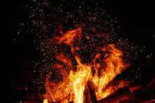 Night Bonfire With Close-up Sparks. Fire Overlay For Photoshop With Sparks And Open Flames. Bright Night Flame Picture For The Site.