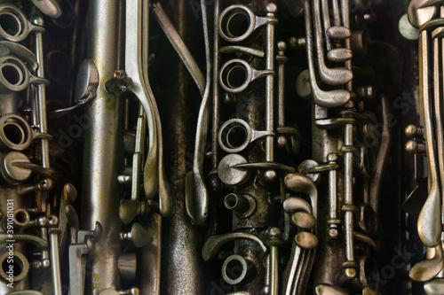 Cuadros en Lienzo Closeup of musical woodwind instruments like flutes clarinets