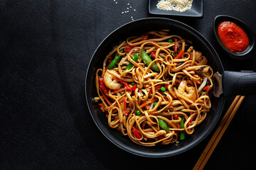 Wall Mural - Asian noodles with shrimps and vegetables