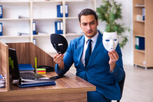 Young Male Employee Wearing Mask In The Office