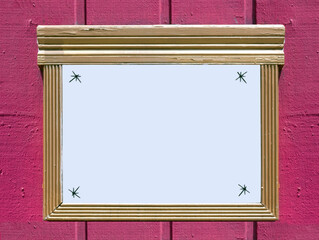 Wall Mural - Handmade gold painted wood sign mounted on raspberry colored outdoor wood wall. Copy space.