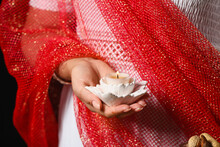 Woman Holding Burning Candle For Celebration Of Divaly On Dark Background, Closeup