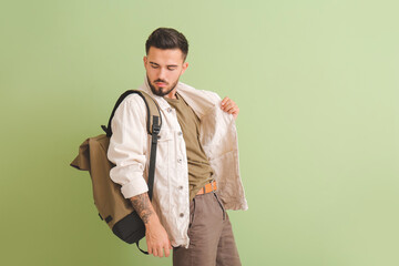 Poster - Fashionable young man on color background