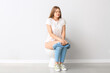 © Pixel-Shot - Woman with problem of frequent urination in restroom. Diabetes symptoms