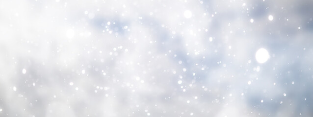 blue snowfall bokeh background, abstract snowflake background on blurred abstract blue