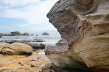 Weathered Rock Against The Blurred Background Taken At Guihou Beach, Taiwan.