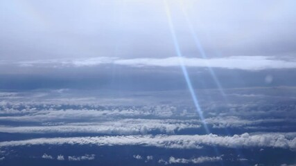Wall Mural - Aerial view flying above clouds in the atmosphere, depicts heaven. space for text